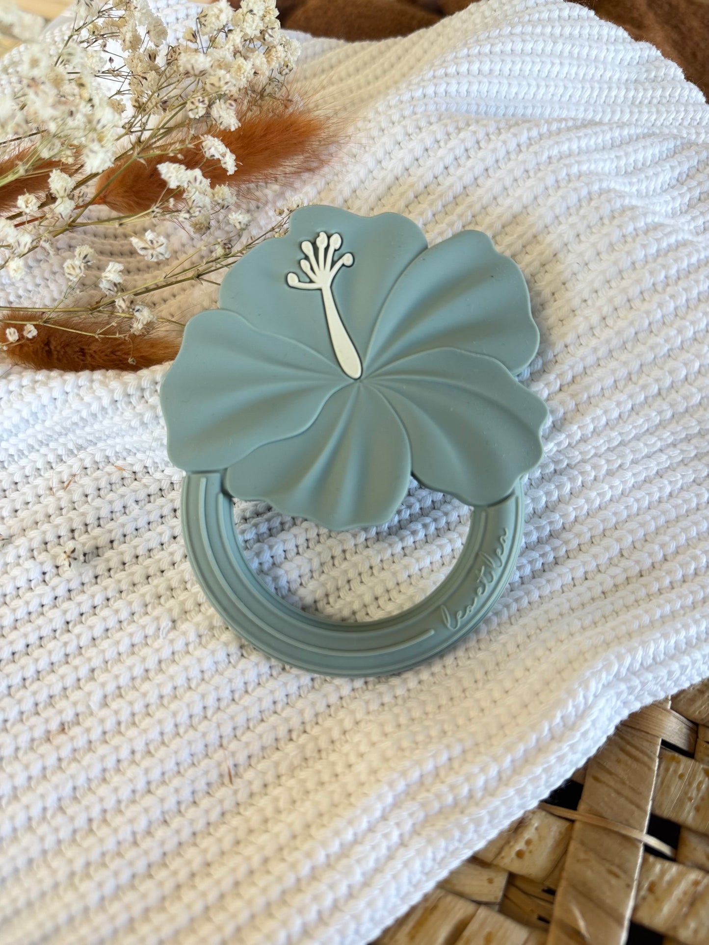 Jouet en silicone hibiscus bleu mer