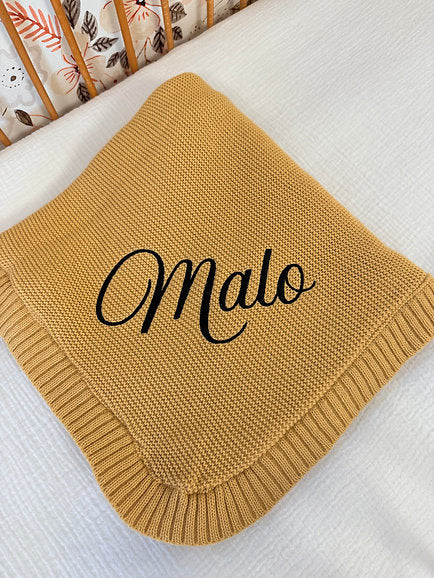 Plaid en laine brodé