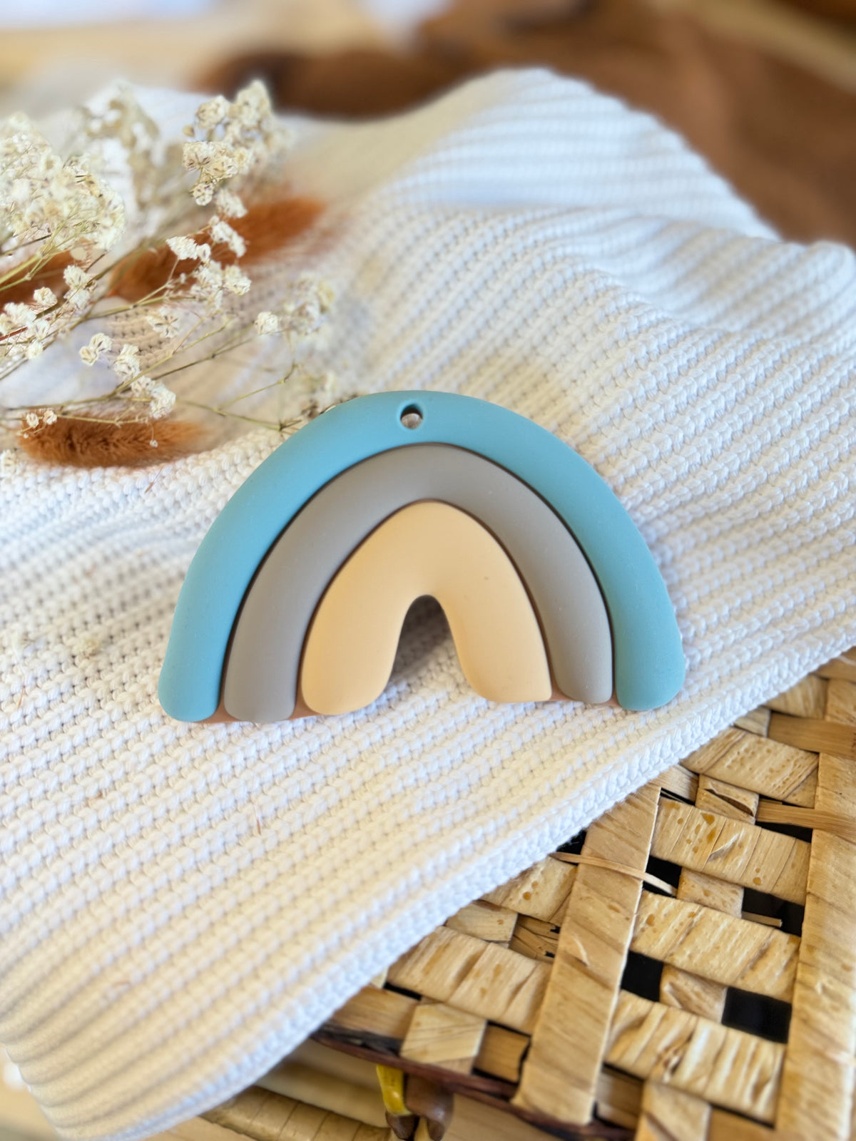 Jouet en silicone arc en ciel bleu