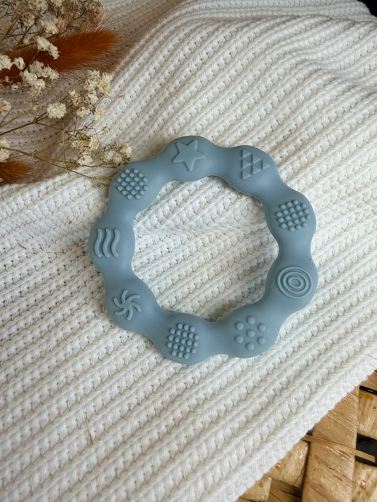 Jouet en silicone rond bleu