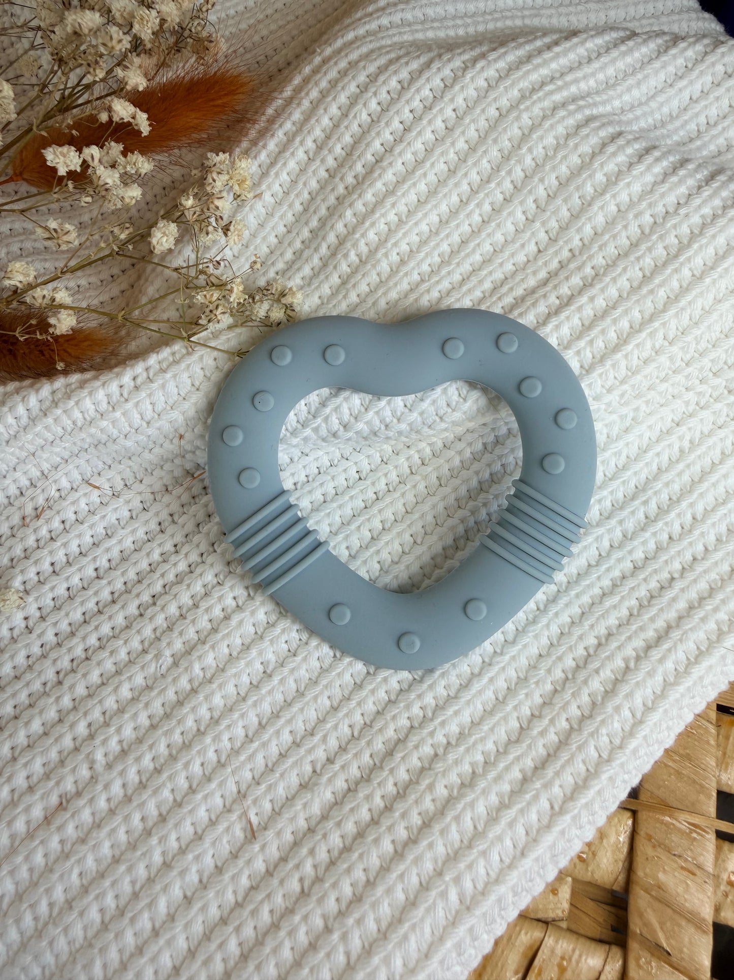 Jouet en silicone coeur bleu