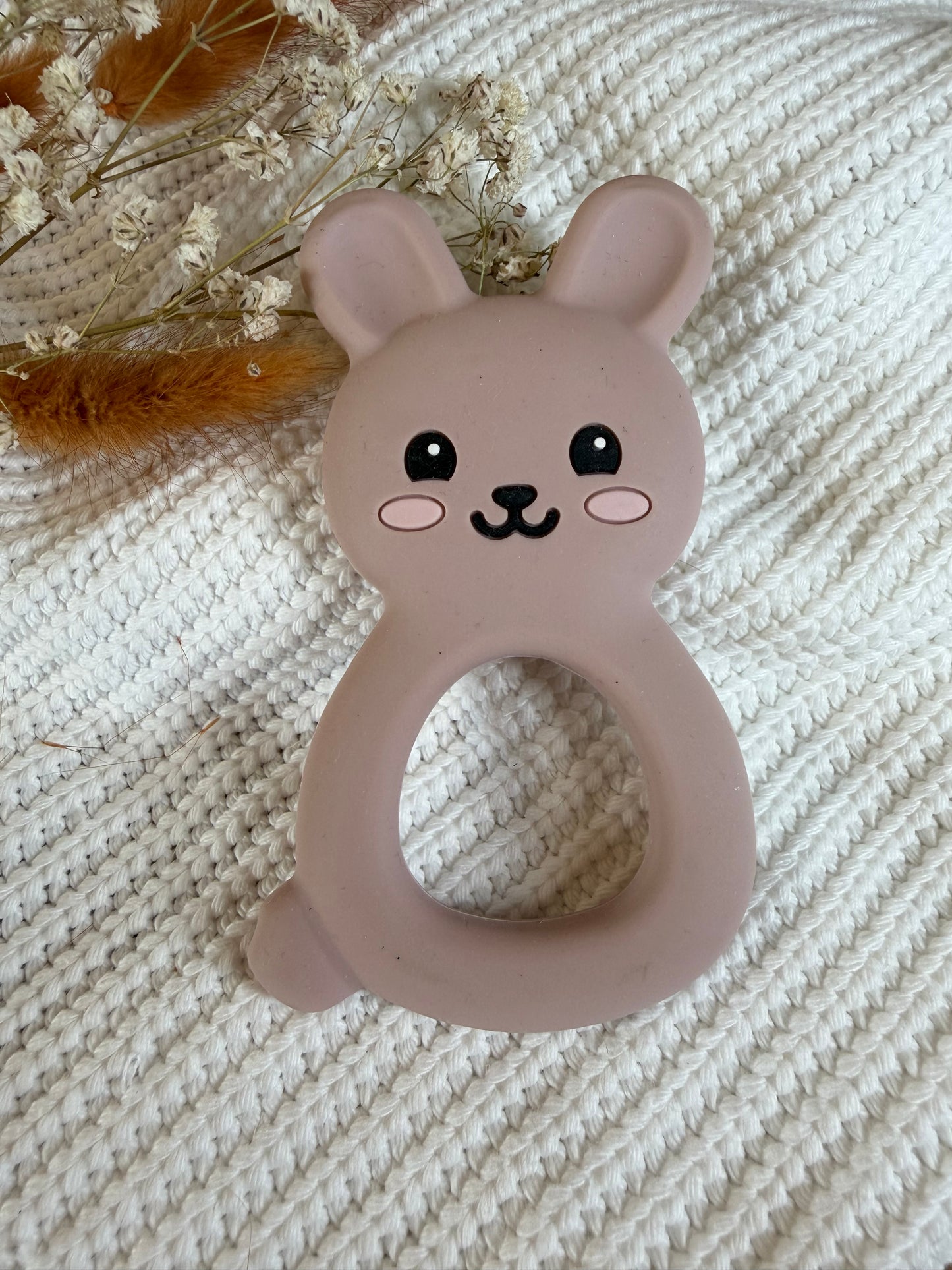 Jouet en silicone lapin rose poudré