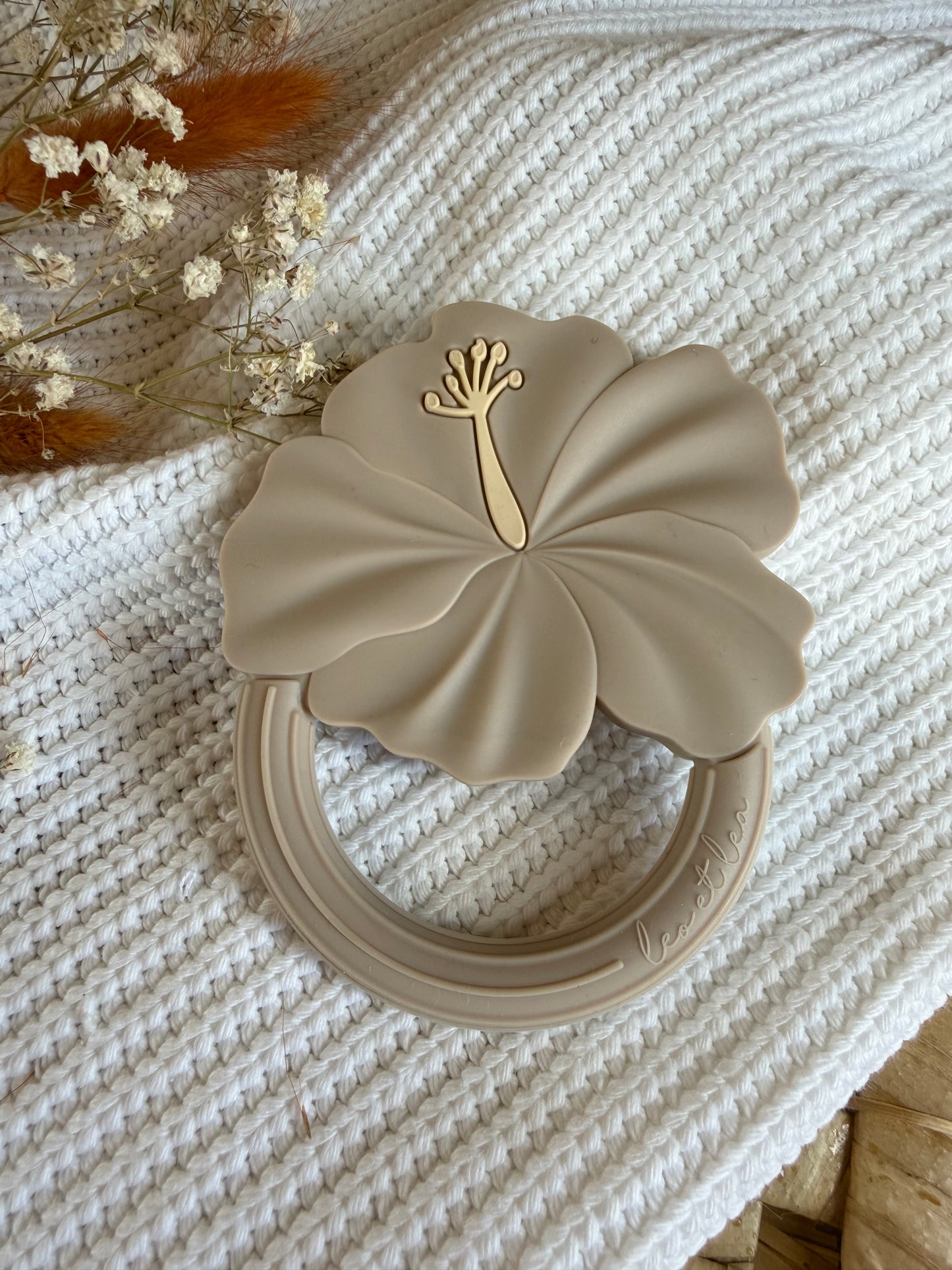 Jouet en silicone hibiscus beige