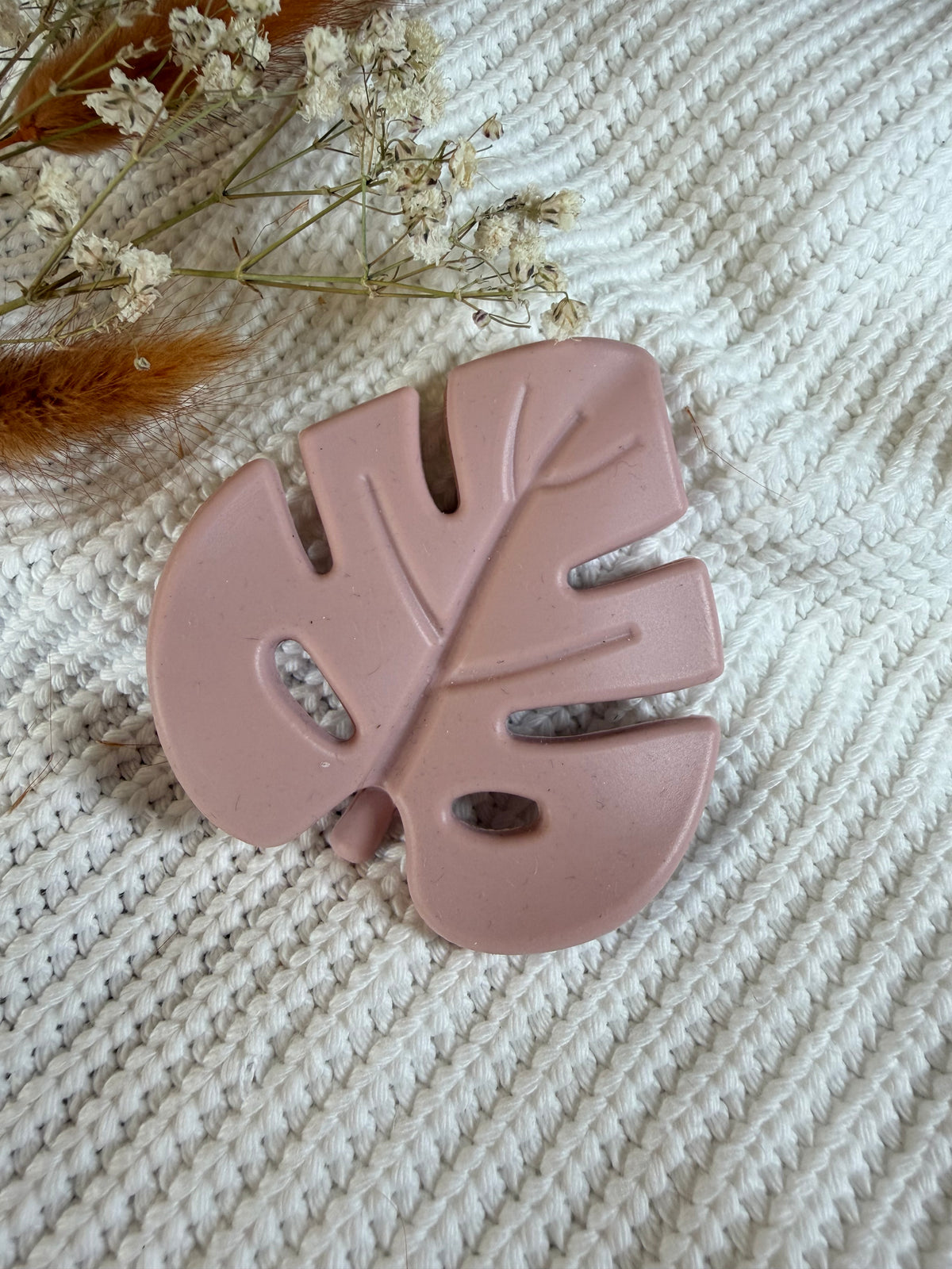 Jouet en silicone feuille rose poudré